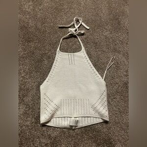 White crocheted cropped halter top.